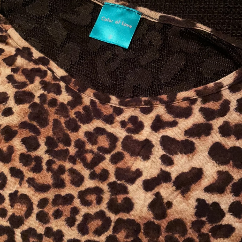 Cheetah print crop top with black lace back. Small